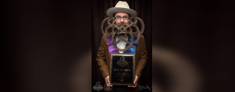 Jason Kiley, winner of “Best in Show” at the World Beard Championships shaves beard to support African American Roundtable